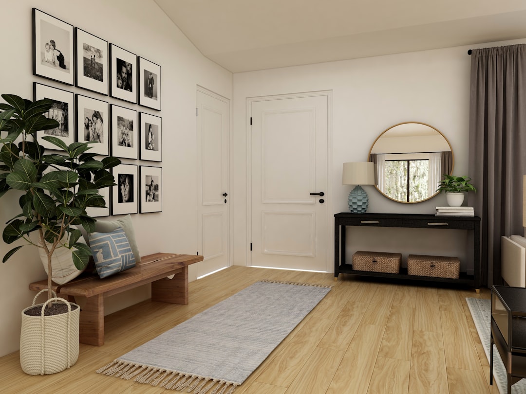 A beautifully styled entryway featuring a console table, decorative plants, and organized storage solutions that create a warm and inviting atmosphere.