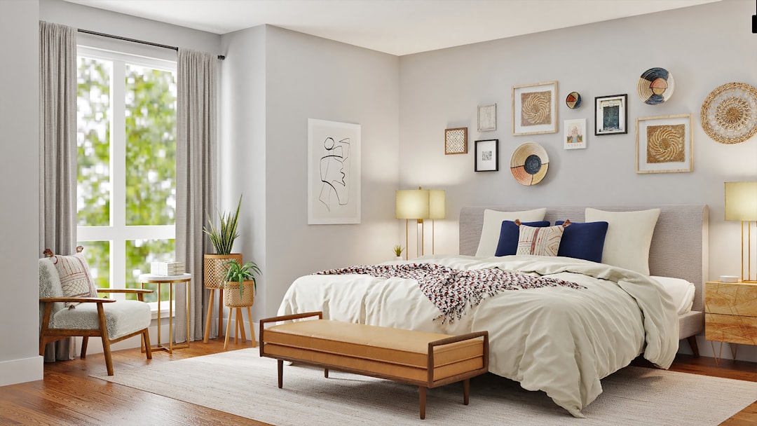 A serene and minimalist bedroom with soft lighting, neutral colors, and simple decor elements that promote relaxation.